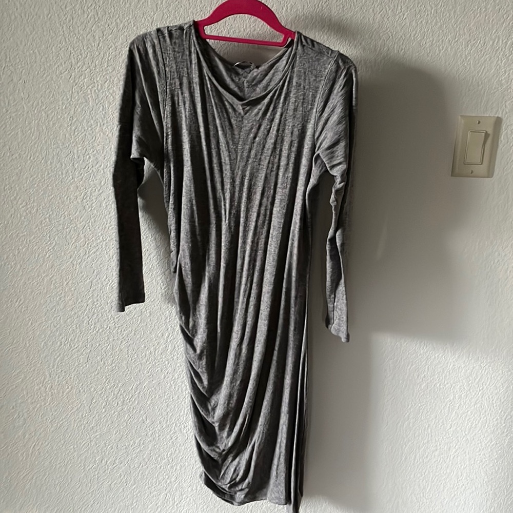 Gray asymmetrical long sleeve dress.